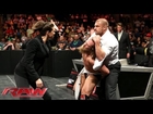 A handcuffed Daniel Bryan is assaulted by Triple H and Stephanie McMahon: Raw, March 17, 2014