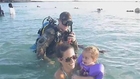 Soldier surprises family with scuba diving reunion